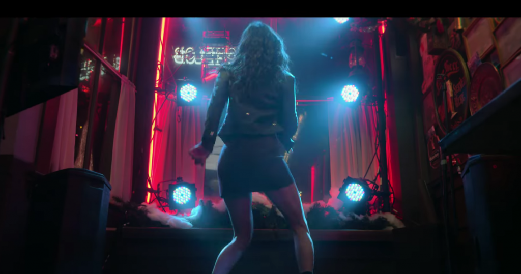 LOVE HARD Song: When Natalie Tries to Impress Tag by Singing “I’d Do Anything for Love”
