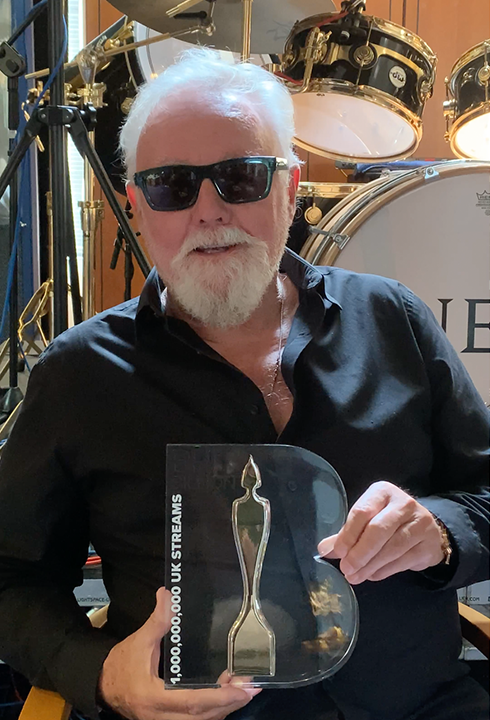 Queen Receives Brit Billion Award for Streaming Milestone: ‘We Are Still Around and We Hope to Entertain You a Little’